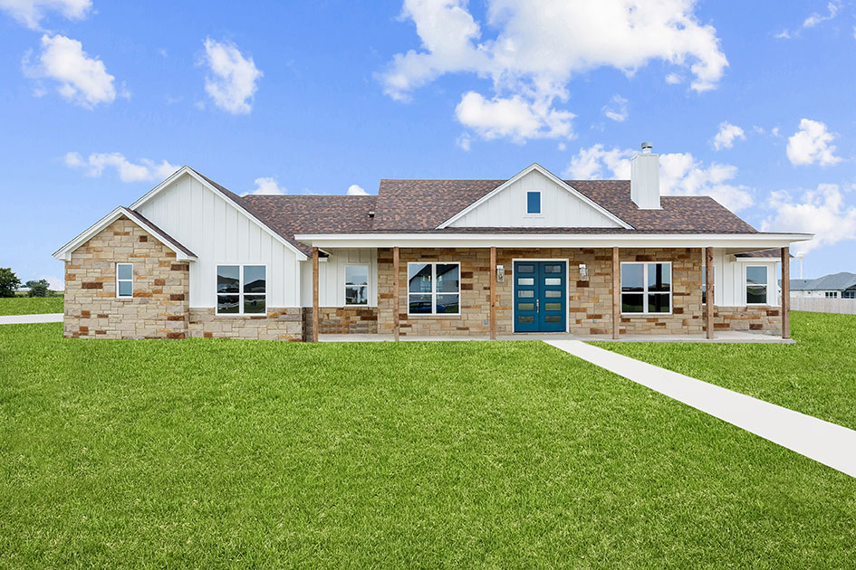 Texas stone and board-and-batten ranch home with teal front door